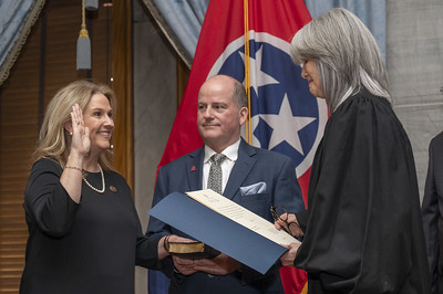 Judge Valerie L. Smith is sworn in by Chief Justice Holly Kirby