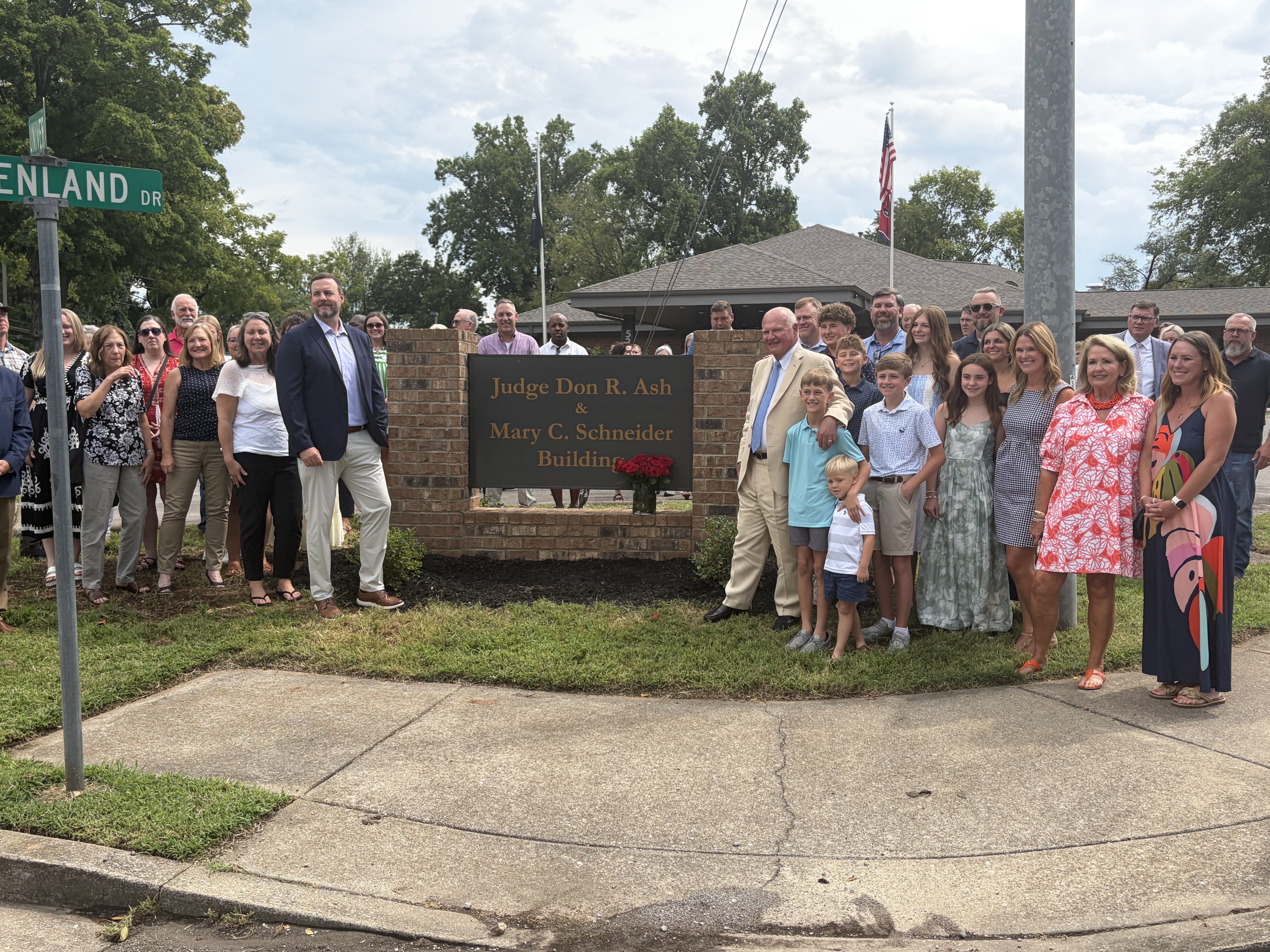 Judge Don R. Ash and family (right) and the family of the late Mary C. Schneider (left)